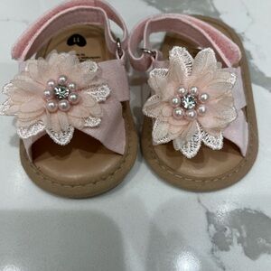 Brand new light, pink flower with pearls and rhinestone, baby girl sandals.
